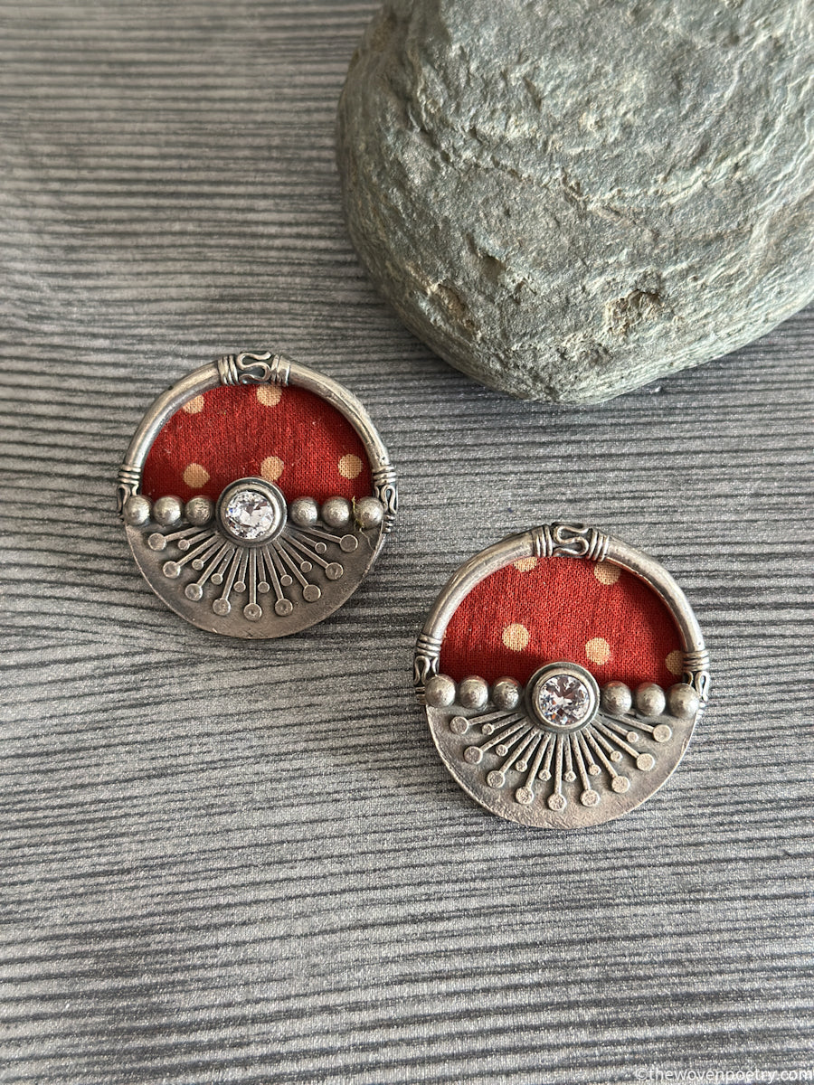 Handcrafted Ajrakh brass statement stud earrings with red Ajrakh fabric by Woven Poetry