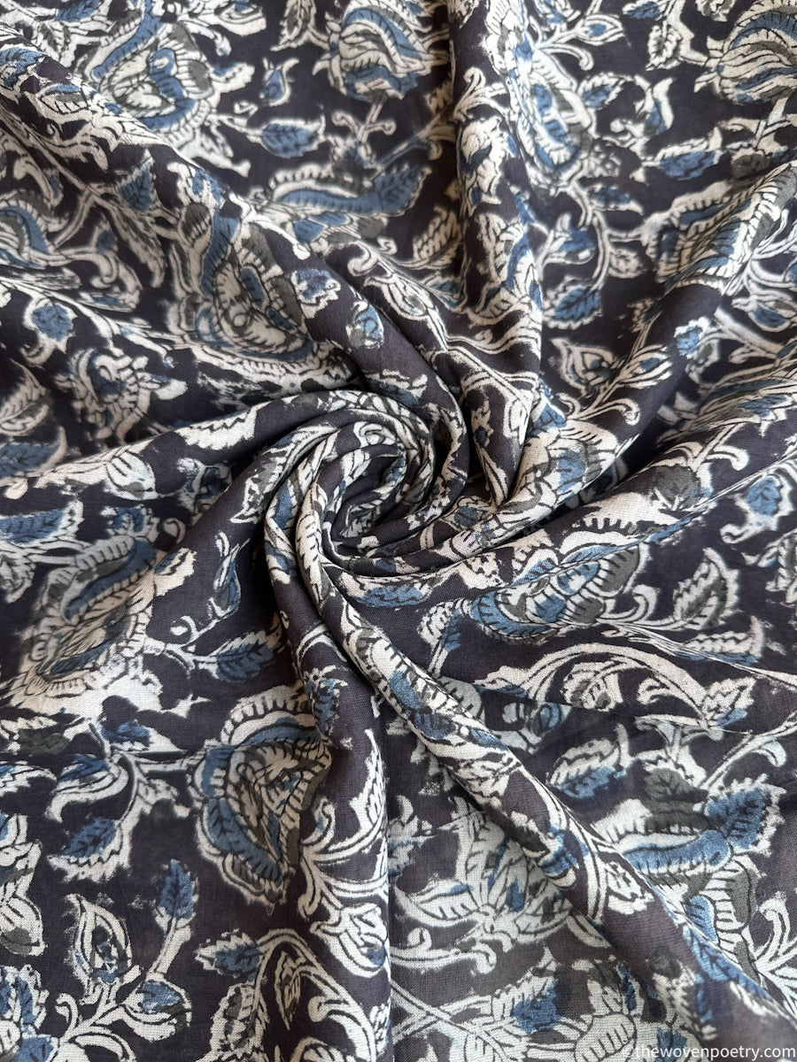 WRITTEN IN INDIGO