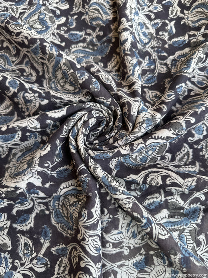 WRITTEN IN INDIGO