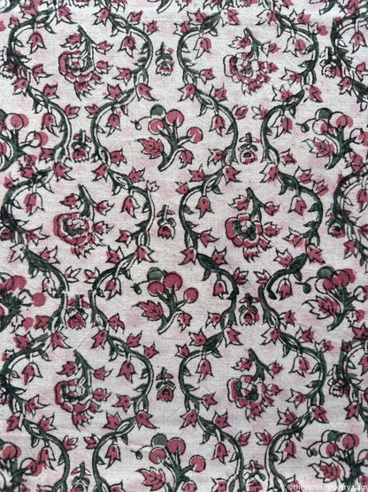 PETALS IN A QUIET COURTYARD
