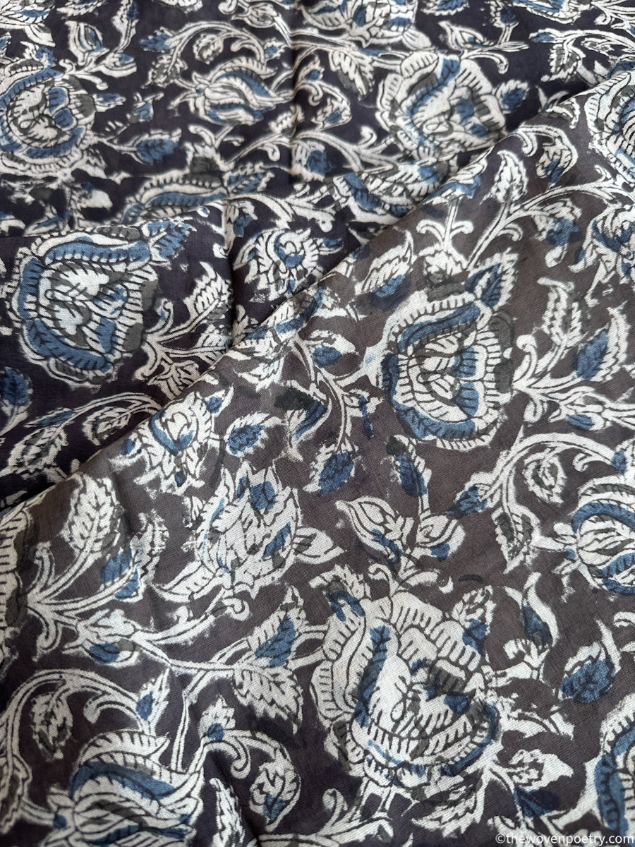 WRITTEN IN INDIGO