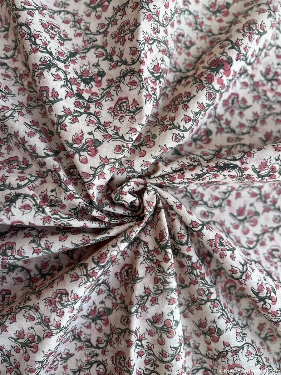 PETALS IN A QUIET COURTYARD