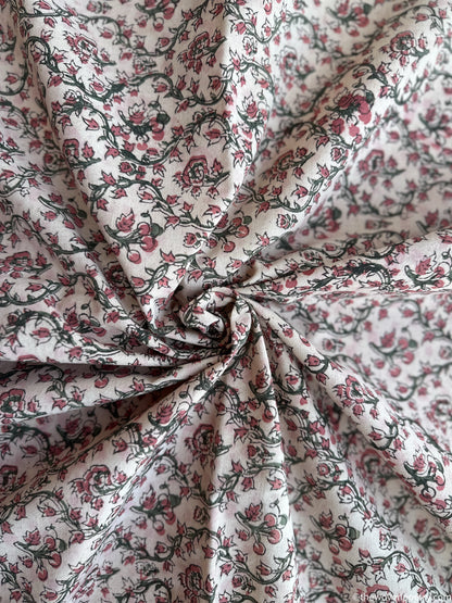 PETALS IN A QUIET COURTYARD