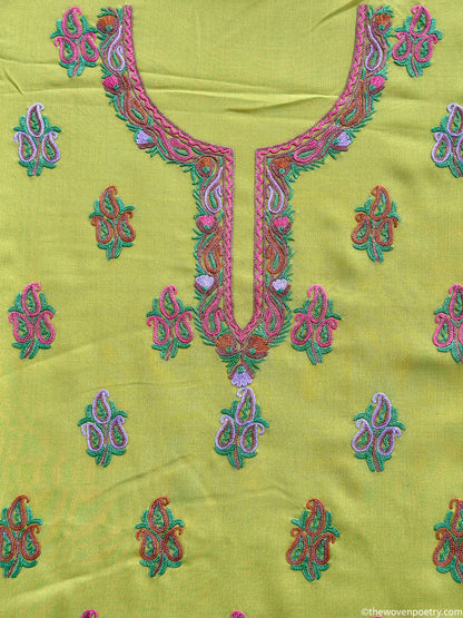 Hand Ari embroidered mulberry cotton suit fabric set in lime green by Woven Poetry