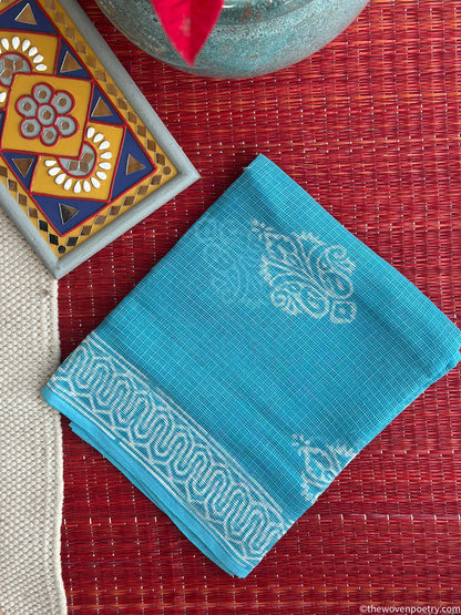 Folded view of Sky Blue Bagru hand block printed Kota Doria suit set by Woven Poetry