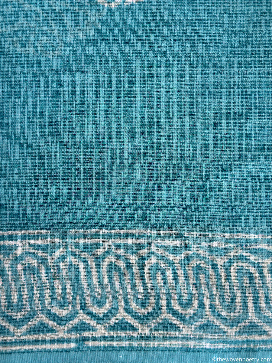 Close-up of Sky Blue Kota Doria fabric texture in Bagru hand block printed suit set