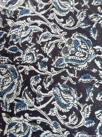 WRITTEN IN INDIGO
