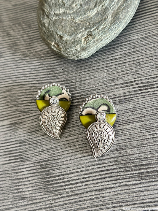 Handcrafted Ajrakh brass enamel paisley stud earrings with green textile detailing