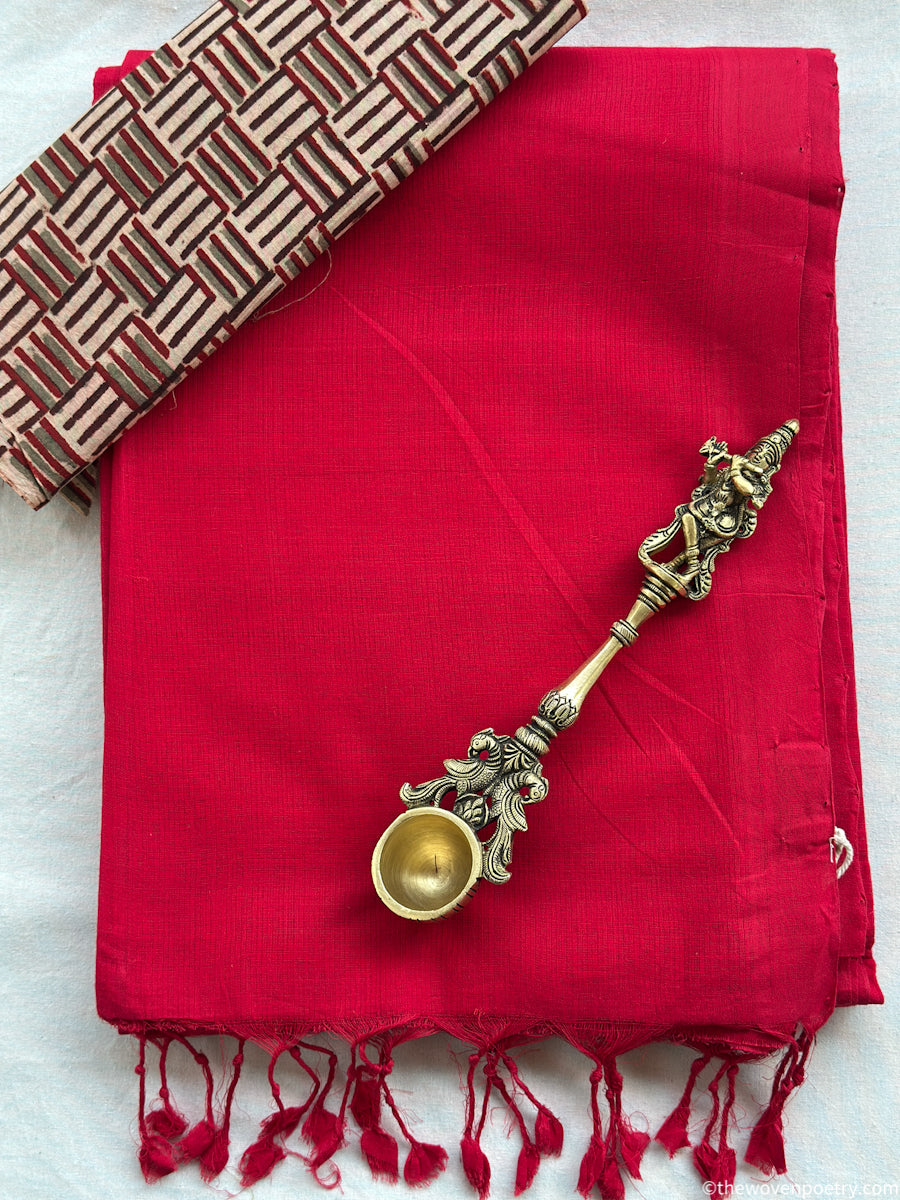 Red cotton saree with geometric blouse

