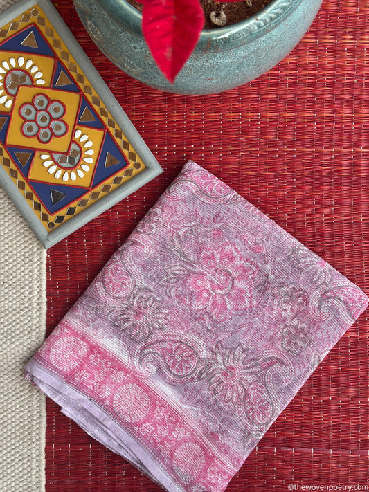 Folded view of pink Sanganeri paisley Kota Doria suit set by Woven Poetry
