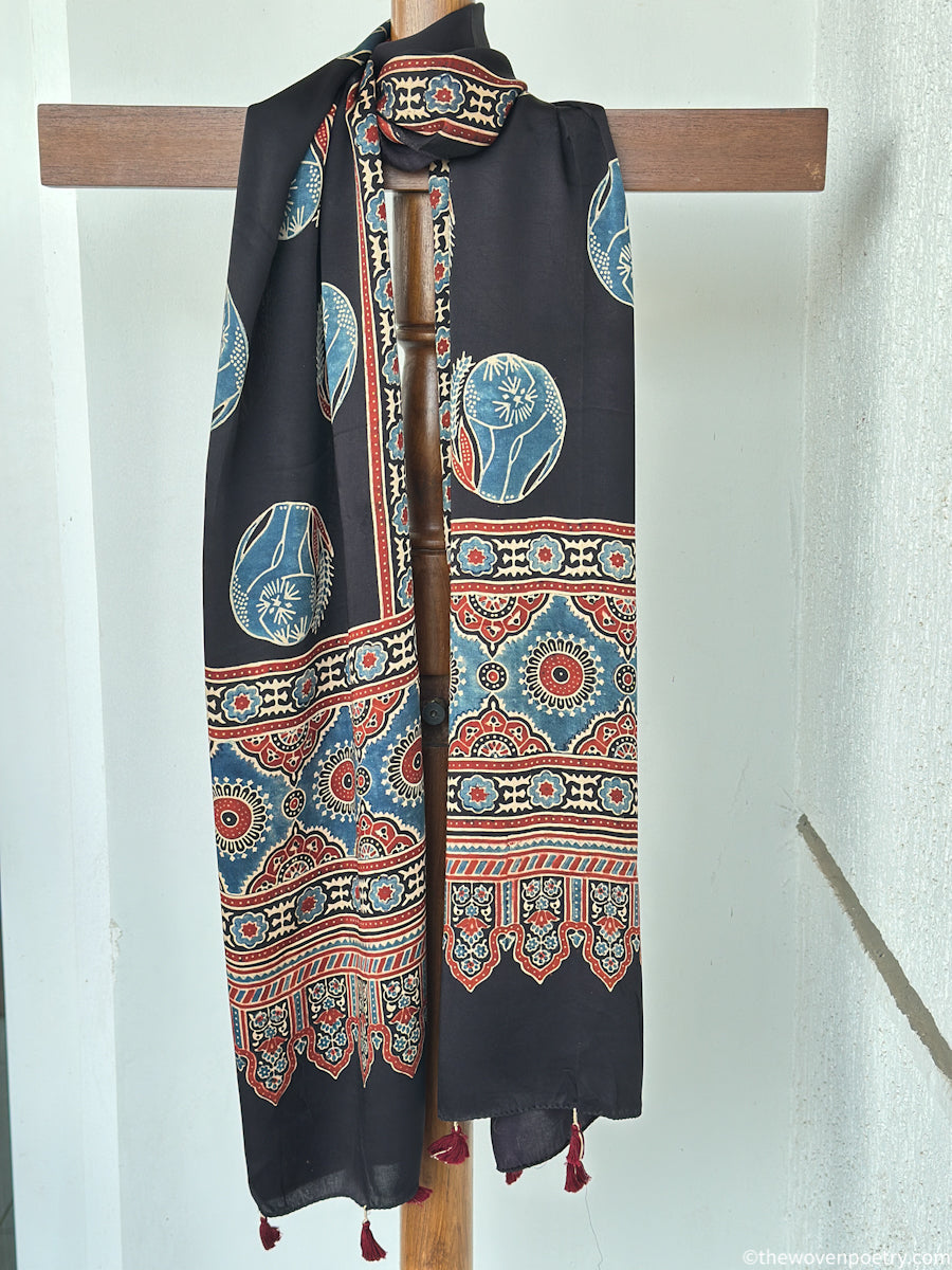 Black modal silk Ajrakh border stole handcrafted by Woven Poetry