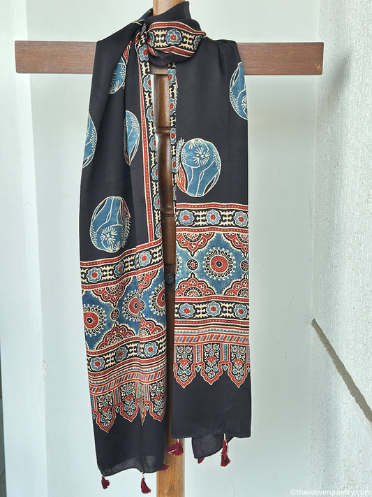 Black modal silk Ajrakh border stole handcrafted by Woven Poetry