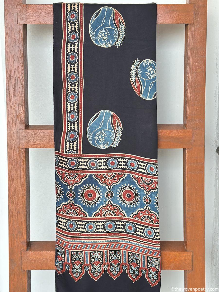 Black modal silk Ajrakh border stole handcrafted by Woven Poetry