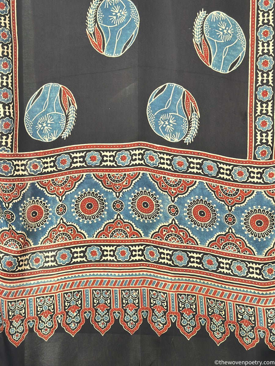Black modal silk Ajrakh border stole handcrafted by Woven Poetry